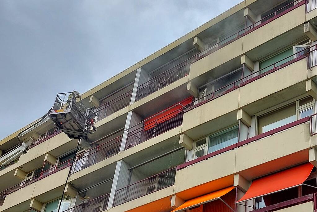 Etage appartementencomplex ontruimd bij brand