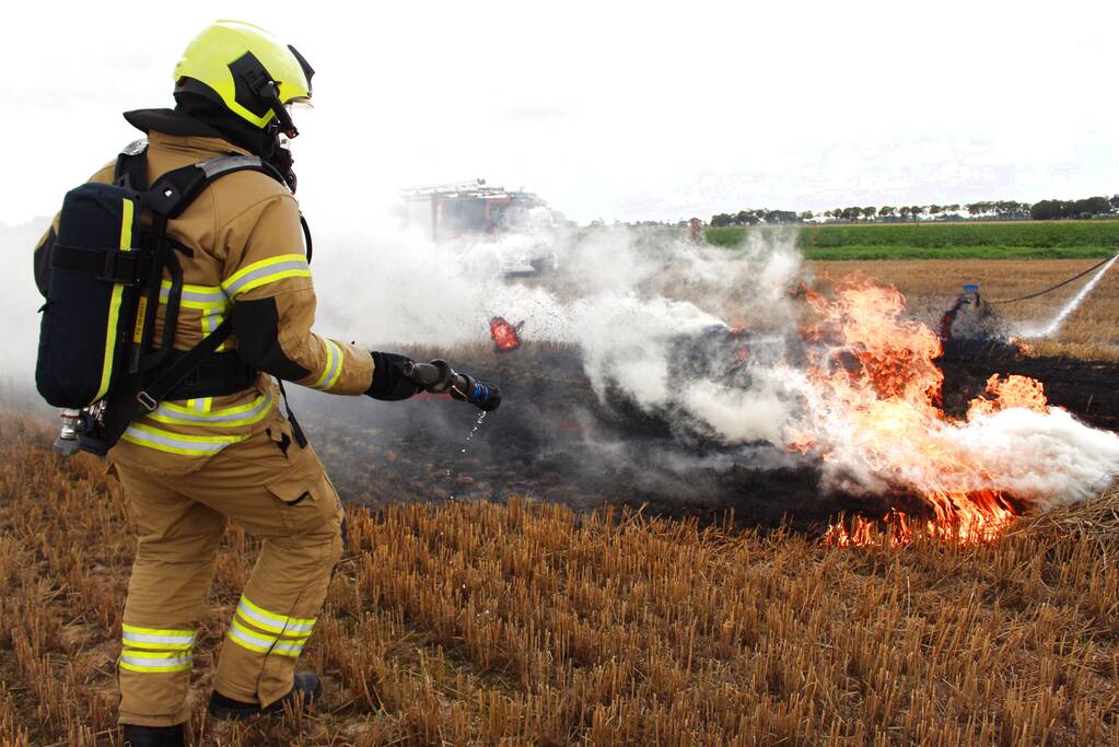 Hooi balenpers vliegt in brand