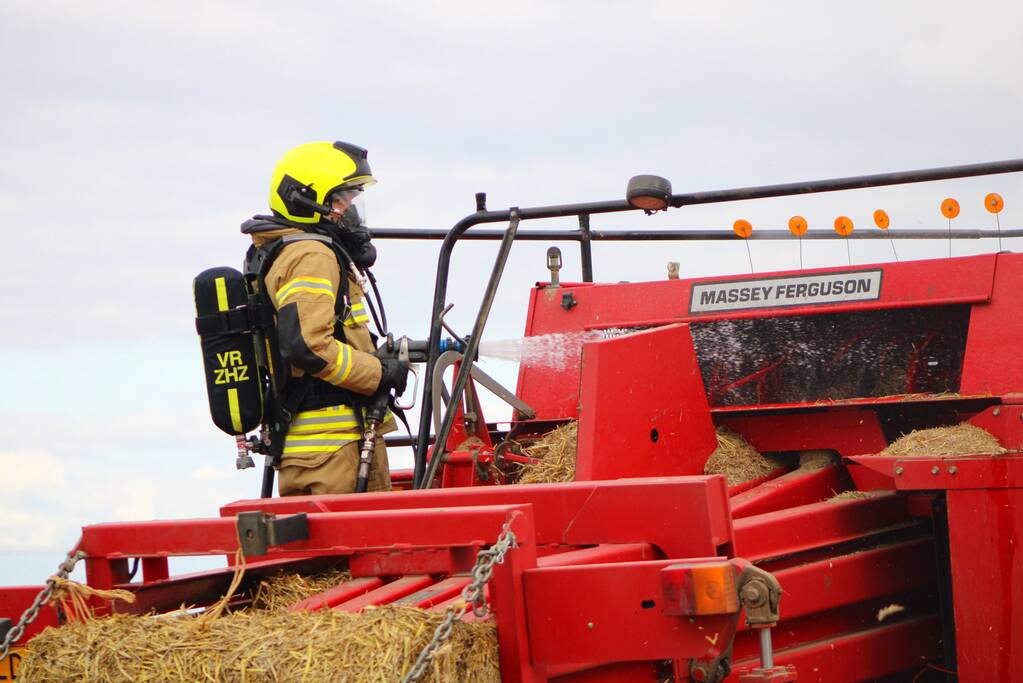 Hooi balenpers vliegt in brand
