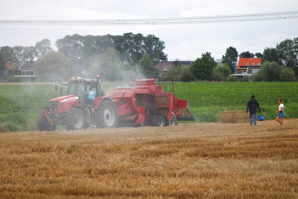 Hooi balenpers vliegt in brand