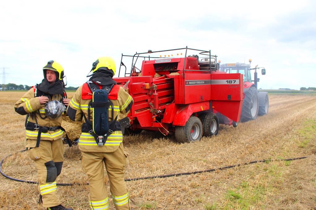 Hooi balenpers vliegt in brand