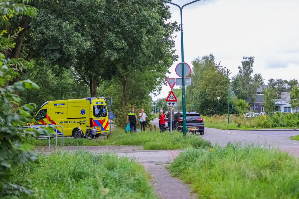 Twee fietsers met elkaar in botsing