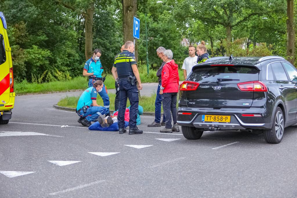 Twee fietsers met elkaar in botsing