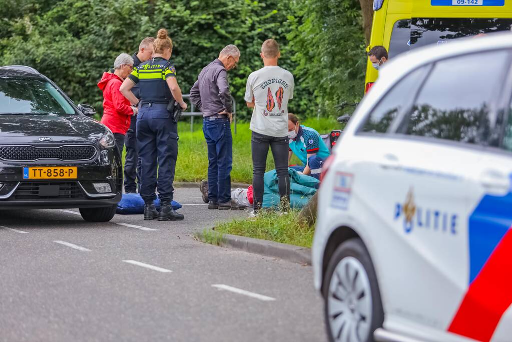 Twee fietsers met elkaar in botsing