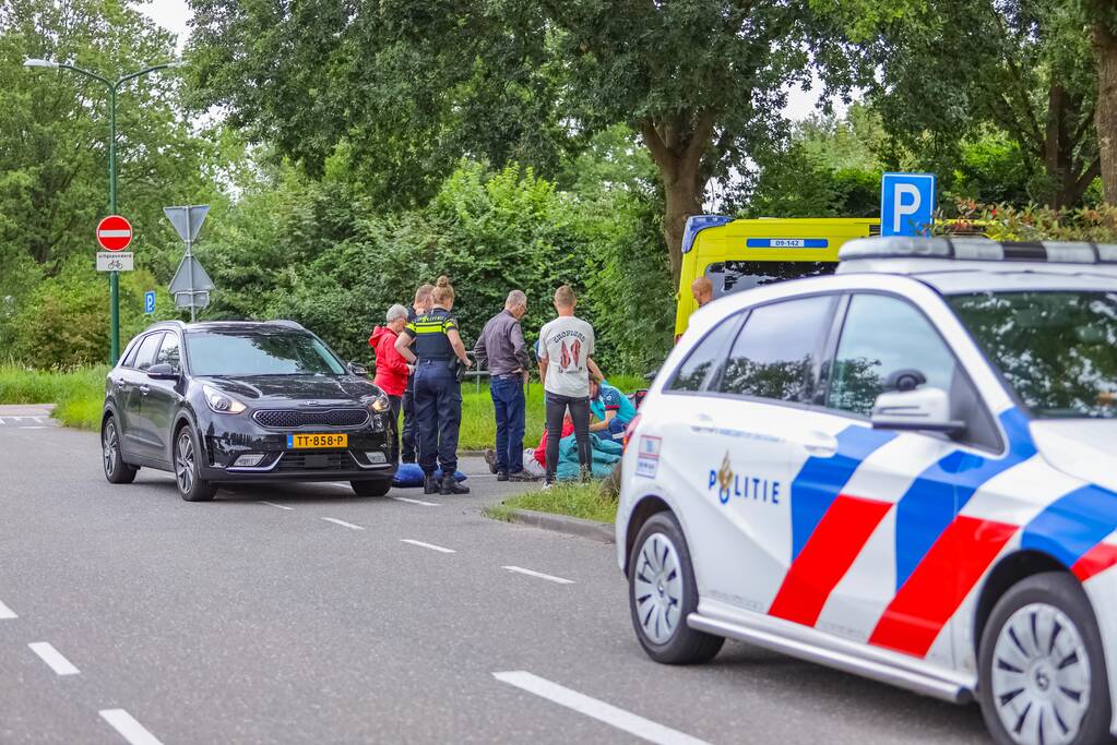 Twee fietsers met elkaar in botsing
