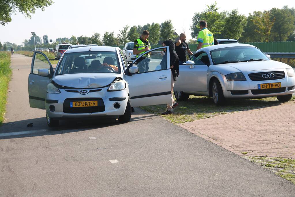 Persoon gewond bij kop-staartbotsing