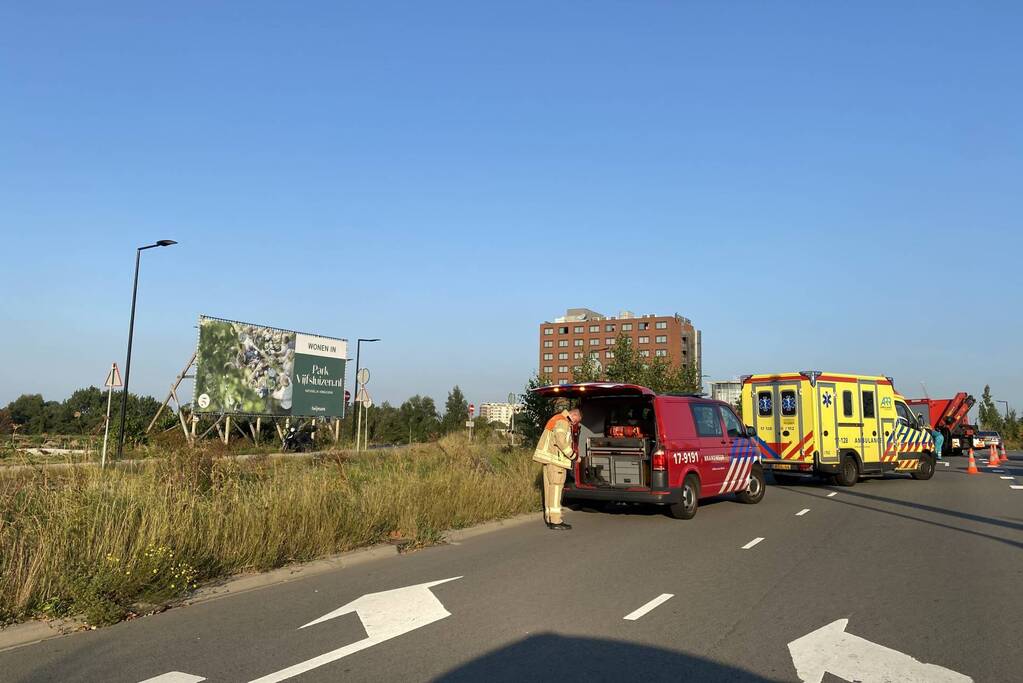 Persoon bekneld en gewond bij ongeval