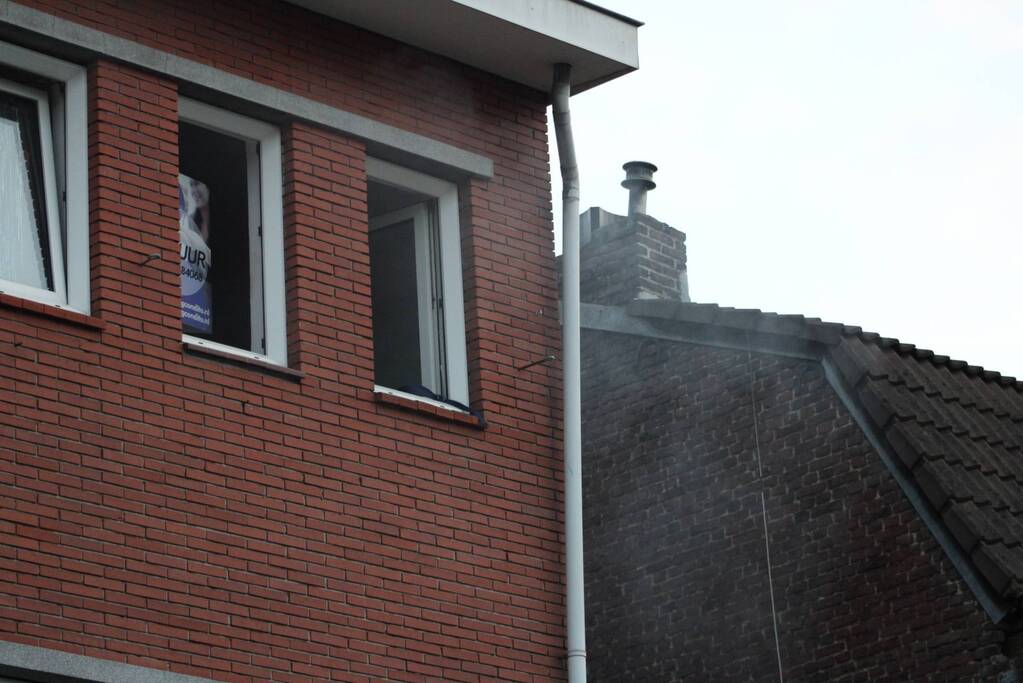 Woning vol rook door brand