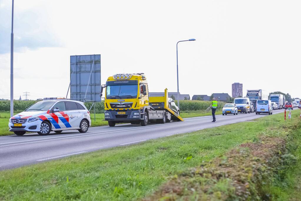 Schade aan personenauto's door kopstaart botsing