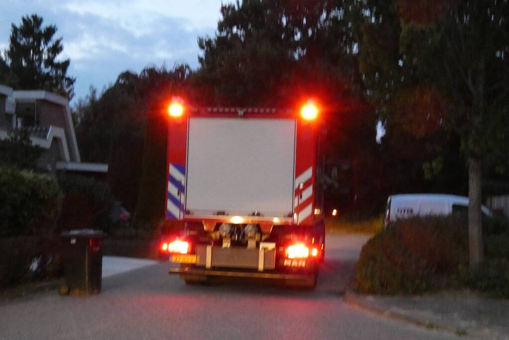 Brandweer blust schoorsteenbrand