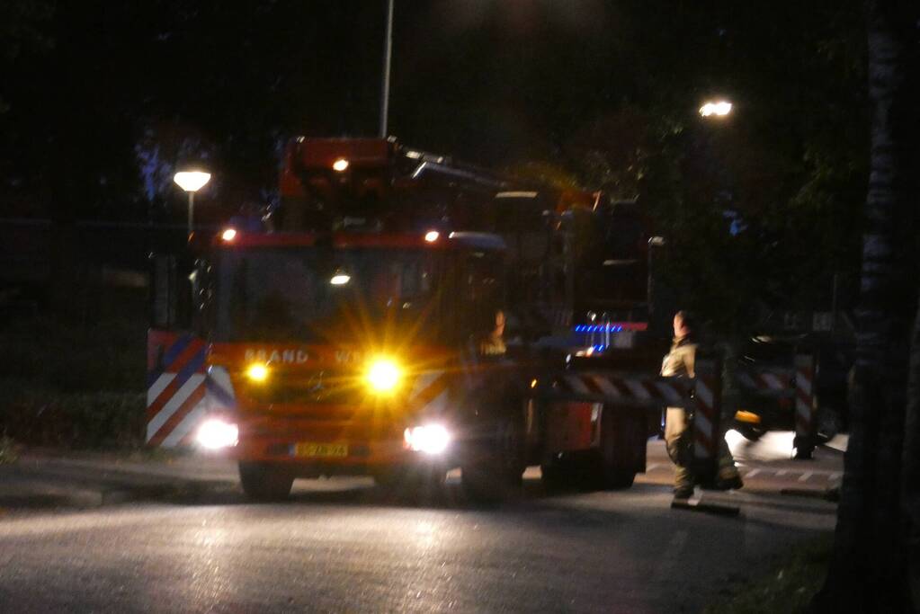 Brandweer blust schoorsteenbrand
