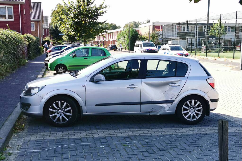 Scooterrijder in botsing met personenauto