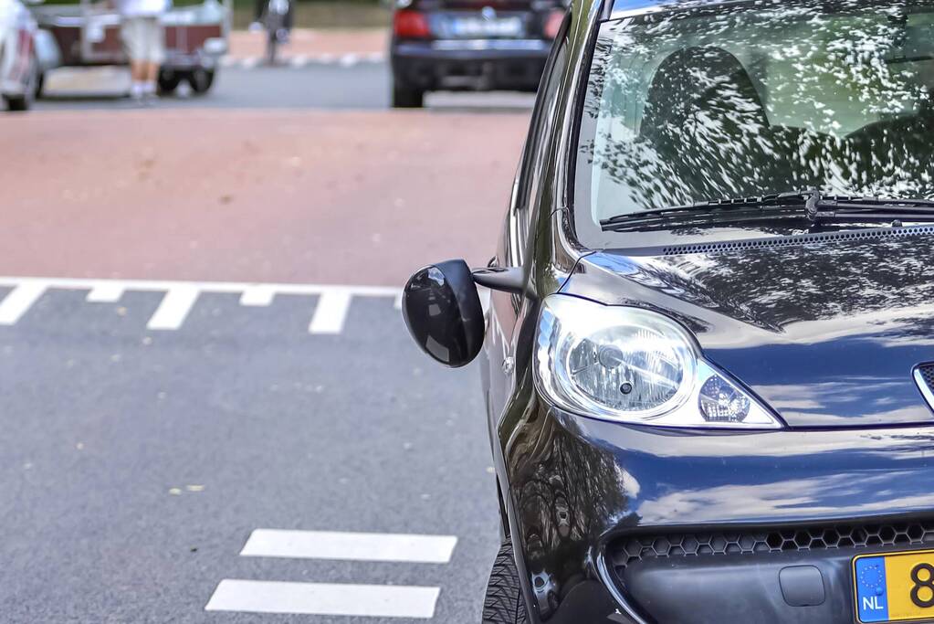 Man op scooter gewond bij aanrijding