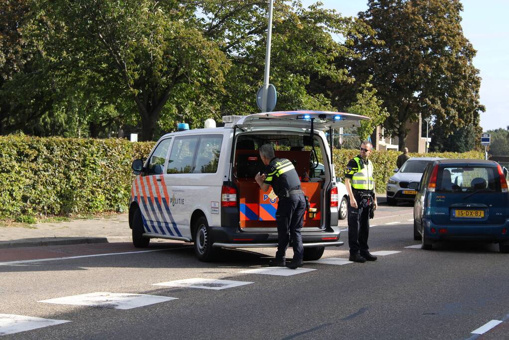 Racefietser gewond bij botsing met auto