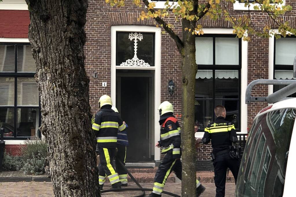 Veel rook bij keukenbrand van woning