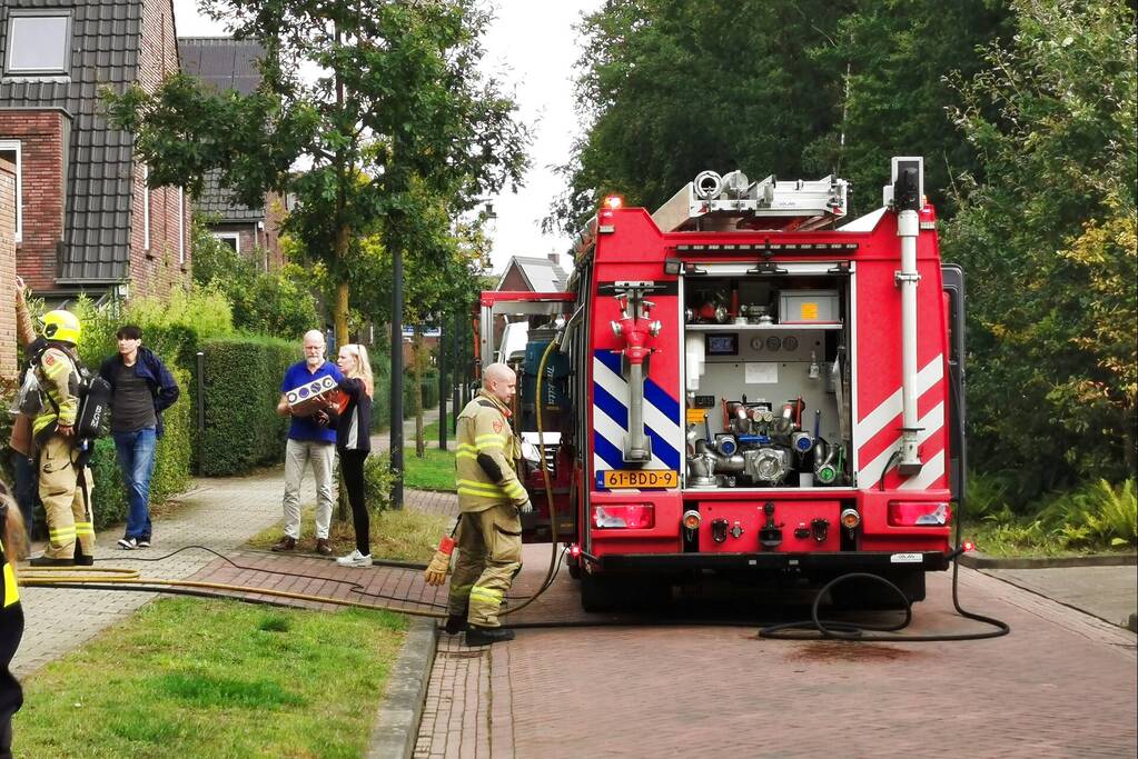Brand in schuur naast woning