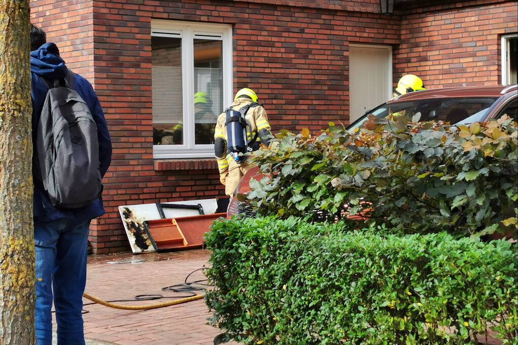 Brand in schuur naast woning