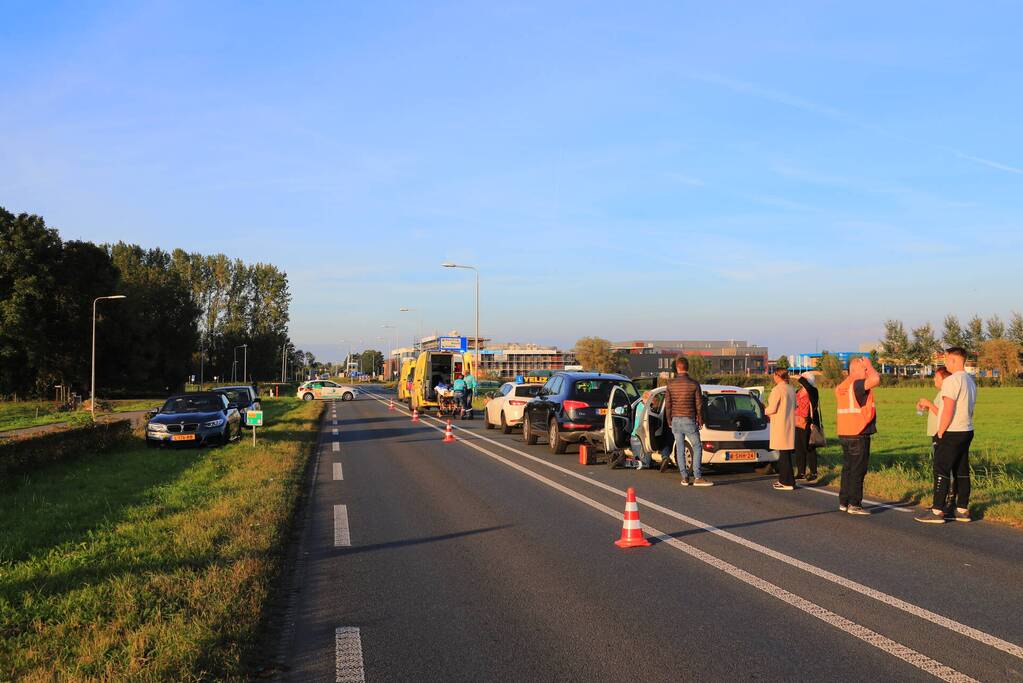 Kop-staartbotsing met lesauto