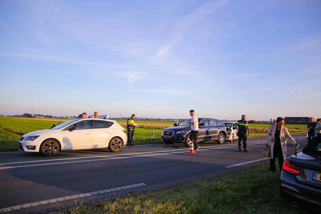 Kop-staartbotsing met lesauto