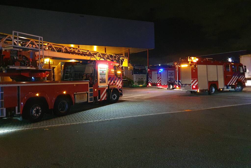 Rookontwikkeling door brand in perscontainer