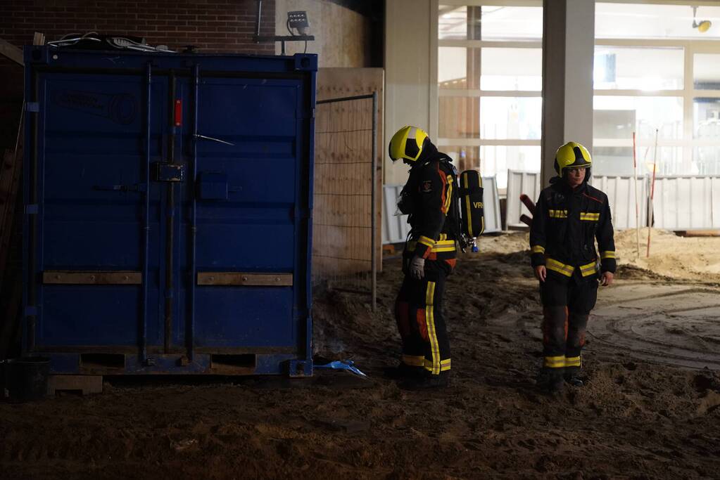 Brand naast bouwcontainer