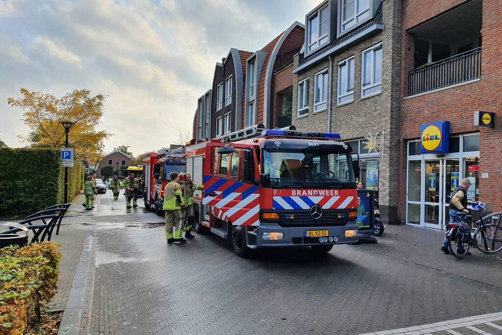 Wegdek bezaaid met olie