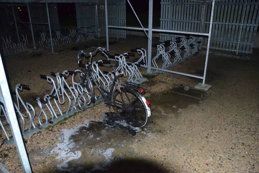 Fiets beschadigd door brand