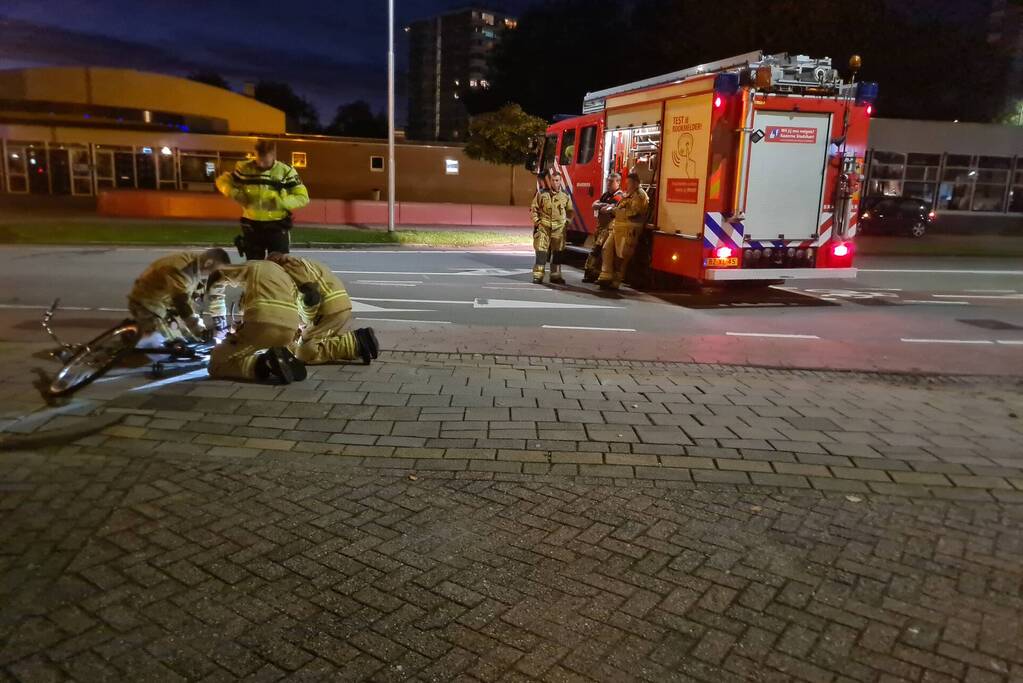 Been van kind klem tussen spaken