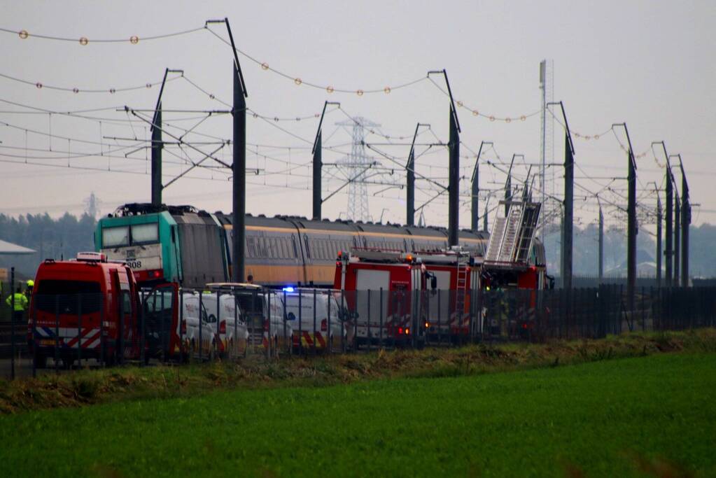 Brand in locomotief van passagierstrein