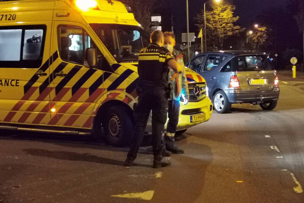 Opzittenden van scooter gewond na ongeval