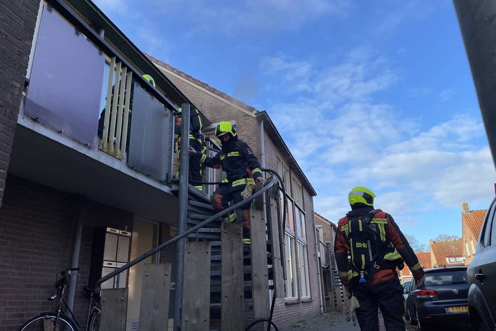 Deur open gezaagd bij brand
