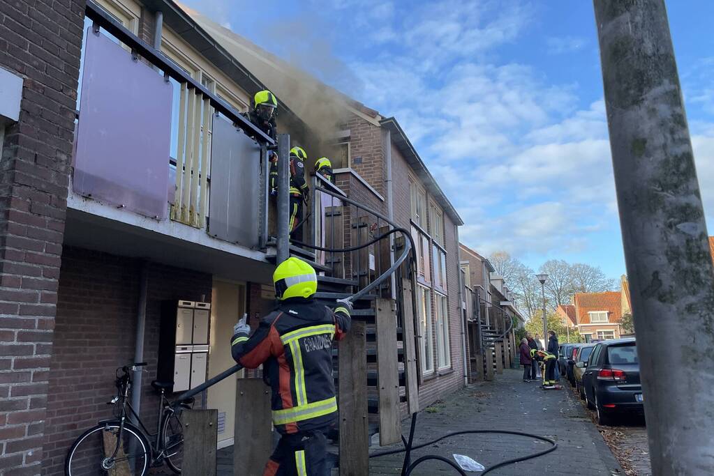 Deur open gezaagd bij brand