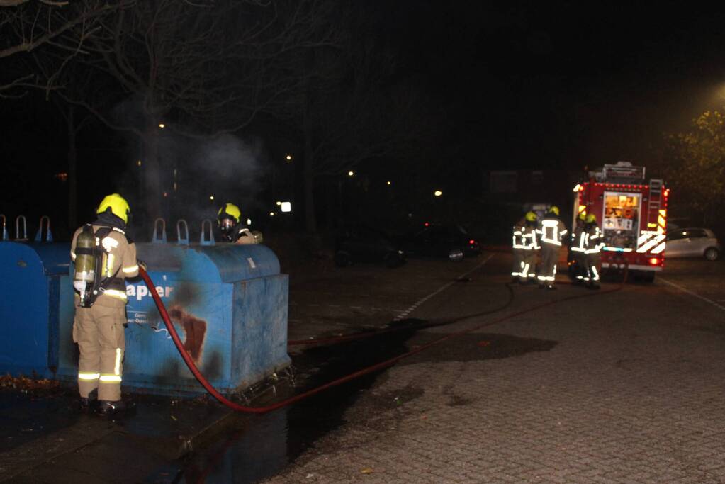 Brandstichting in container met papier