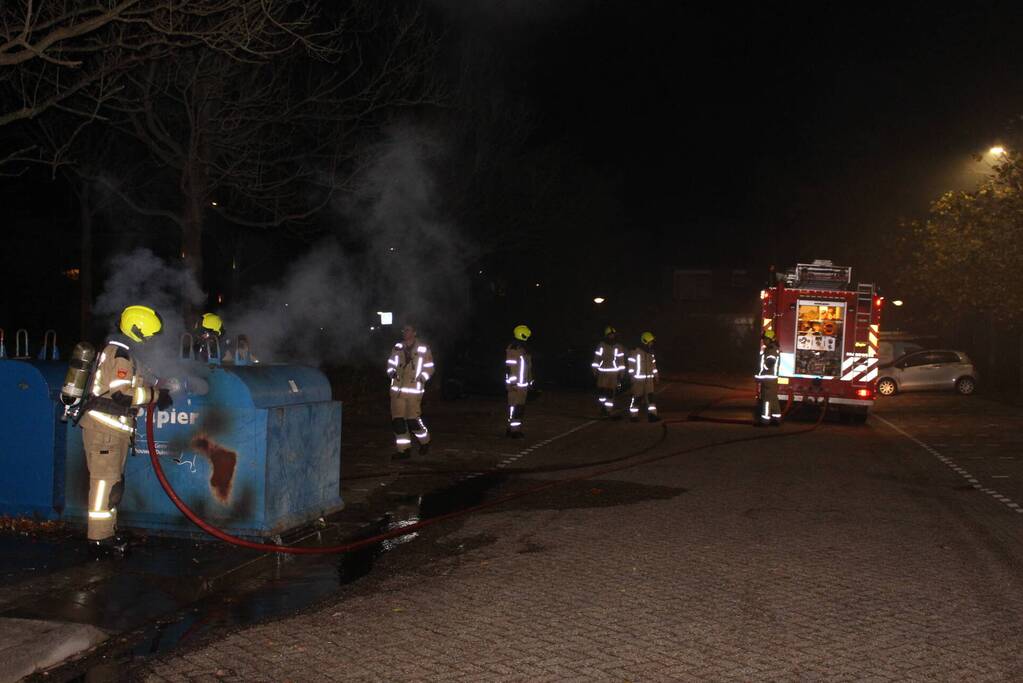 Brandstichting in container met papier