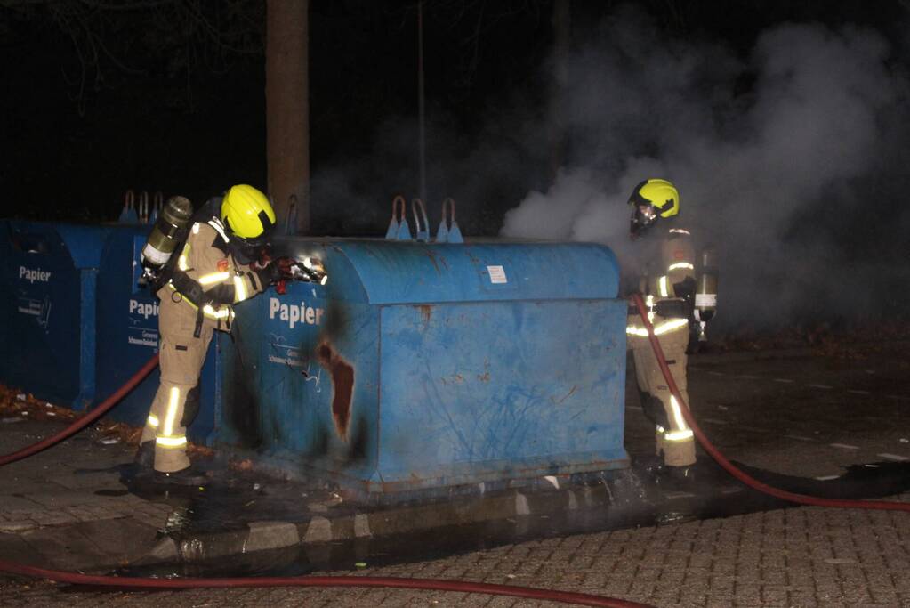 Brandstichting in container met papier