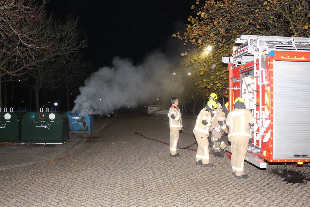 Brandstichting in container met papier