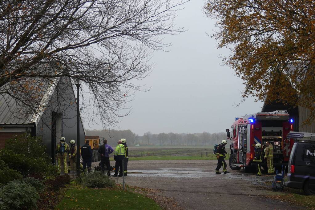 Brand in grasmaaier slaat door naar dak