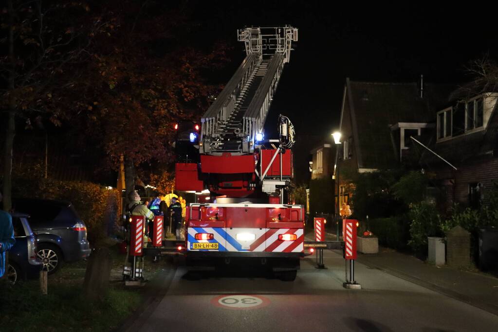 Brand in schoorsteen van woning
