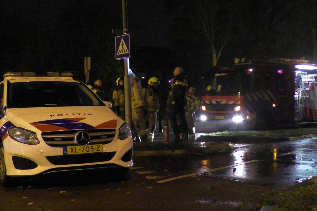 Lantaarnpaal in brand