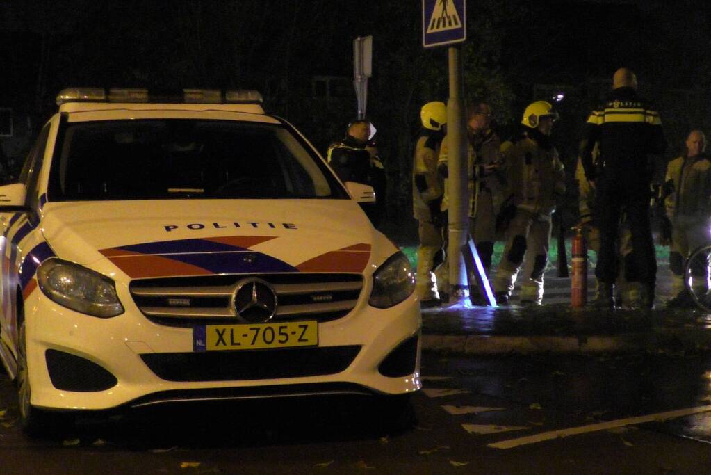 Lantaarnpaal in brand