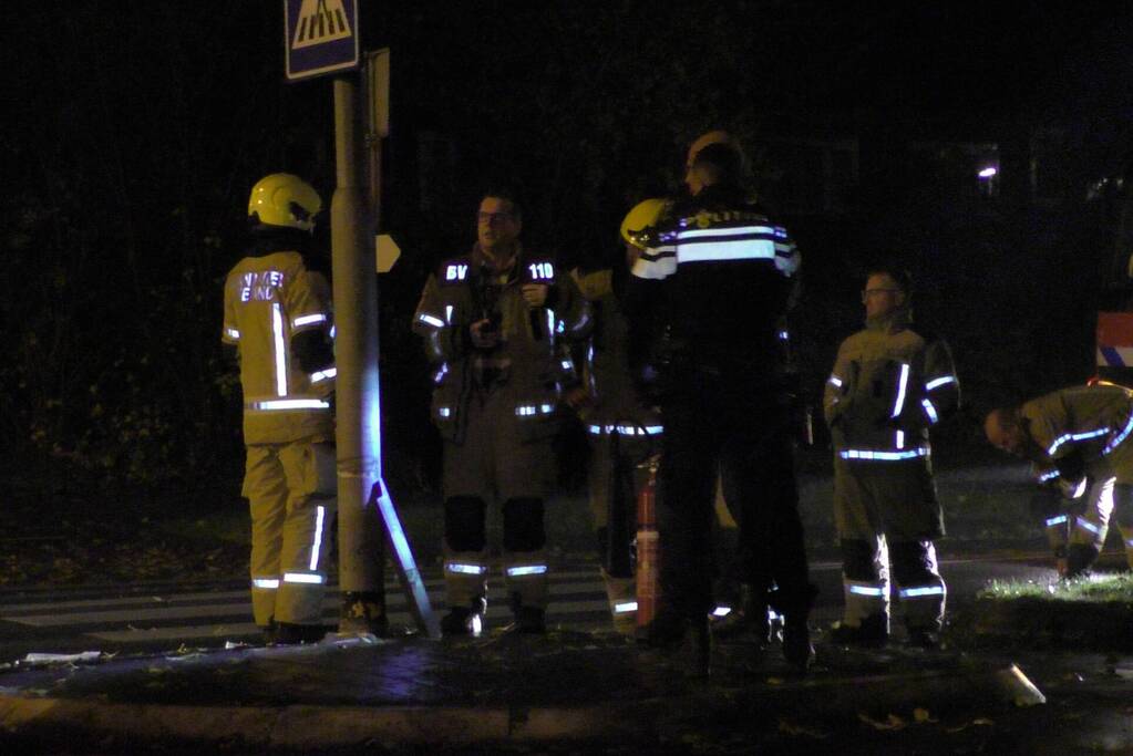 Lantaarnpaal in brand