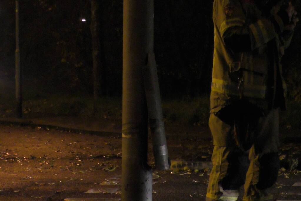 Lantaarnpaal in brand