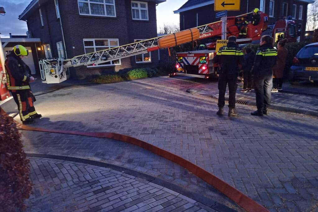 Brand in schoorsteen van woning