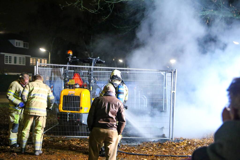 Veel rookontwikkeling door brand in dixi