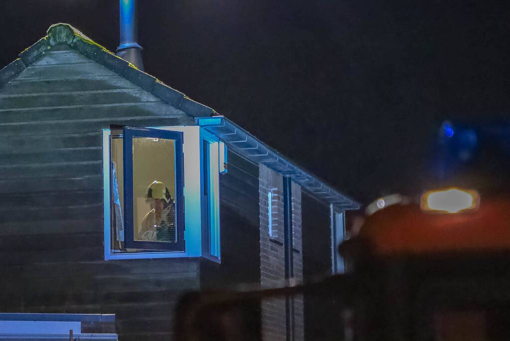 Brandweer blust schoorsteenbrand