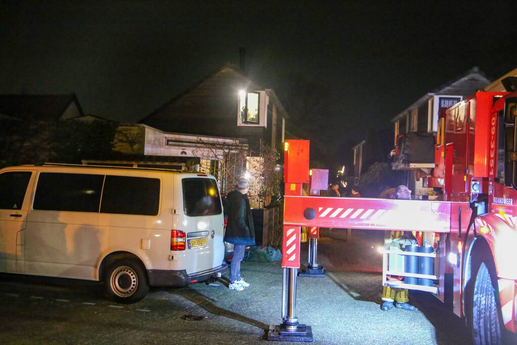 Brandweer blust schoorsteenbrand