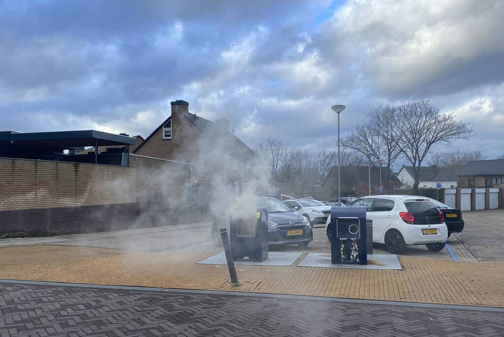 Ondergrondse container in brand