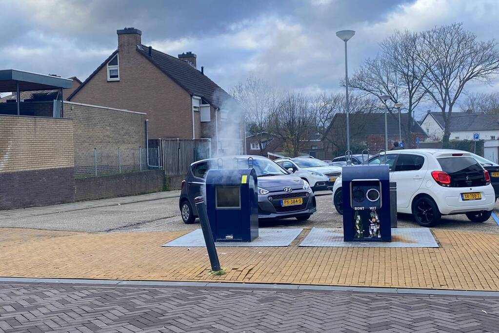 Ondergrondse container in brand