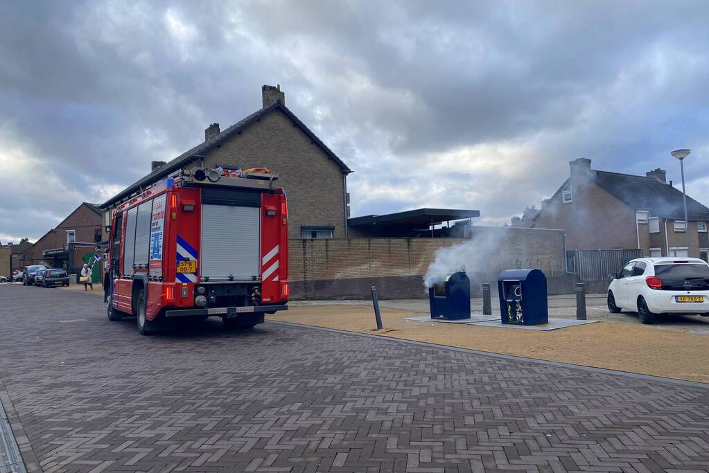 Ondergrondse container in brand