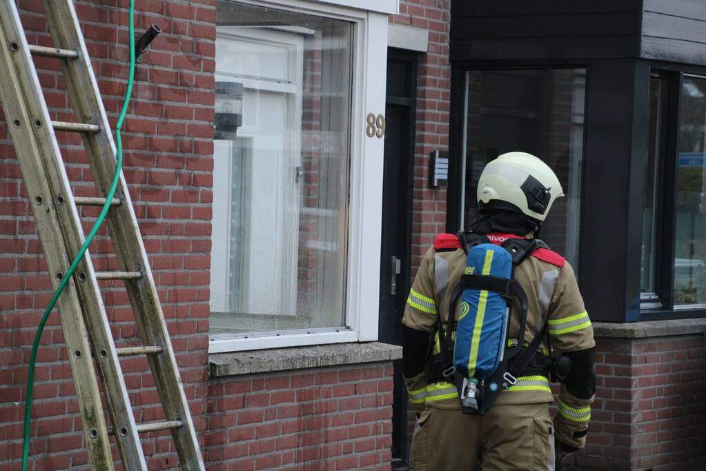 Brand in afzuigkap van woning